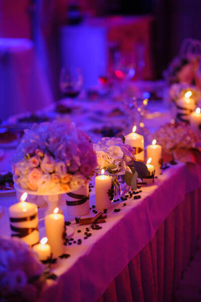 Table decorated with candles for a party